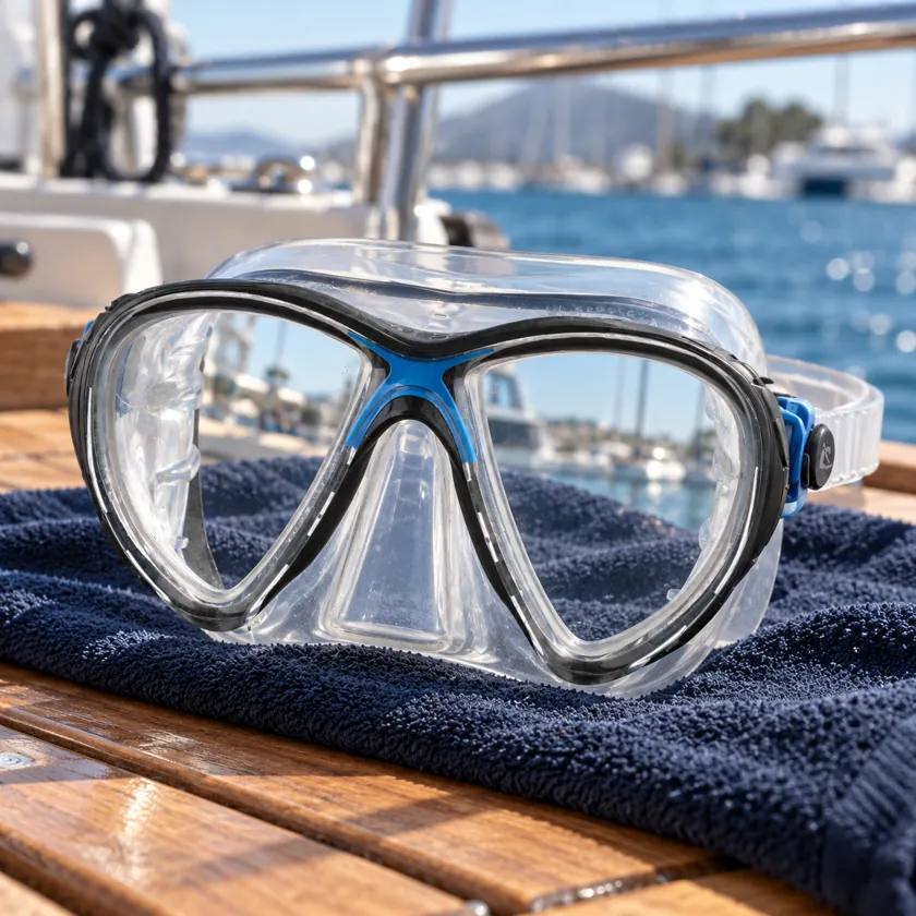 Generated product image of Cressi Big Eyes Evolution Classic resting on a towel aboard a dive boat